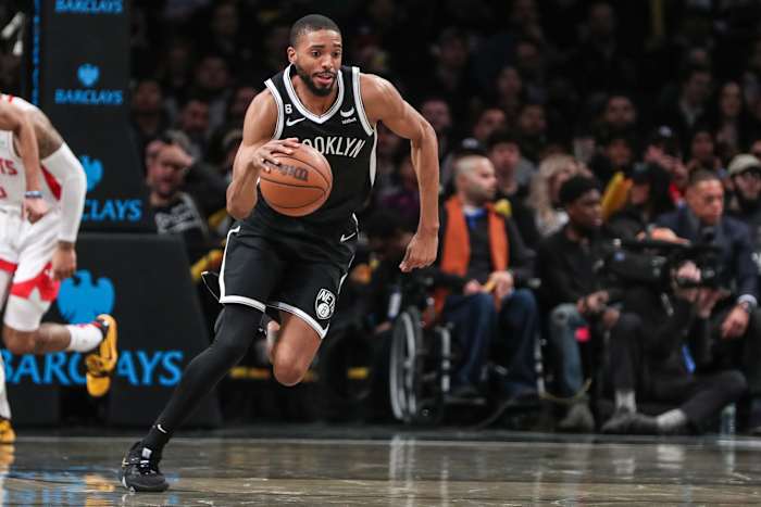 Brooklyn Nets forward Mikal Bridges dribbles the ball.